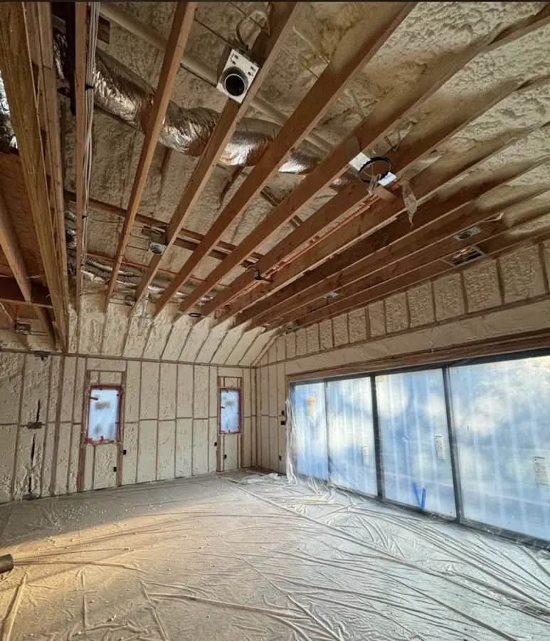 Interior walls and ceiling insulated with spray foam during new construction in Columbia Falls